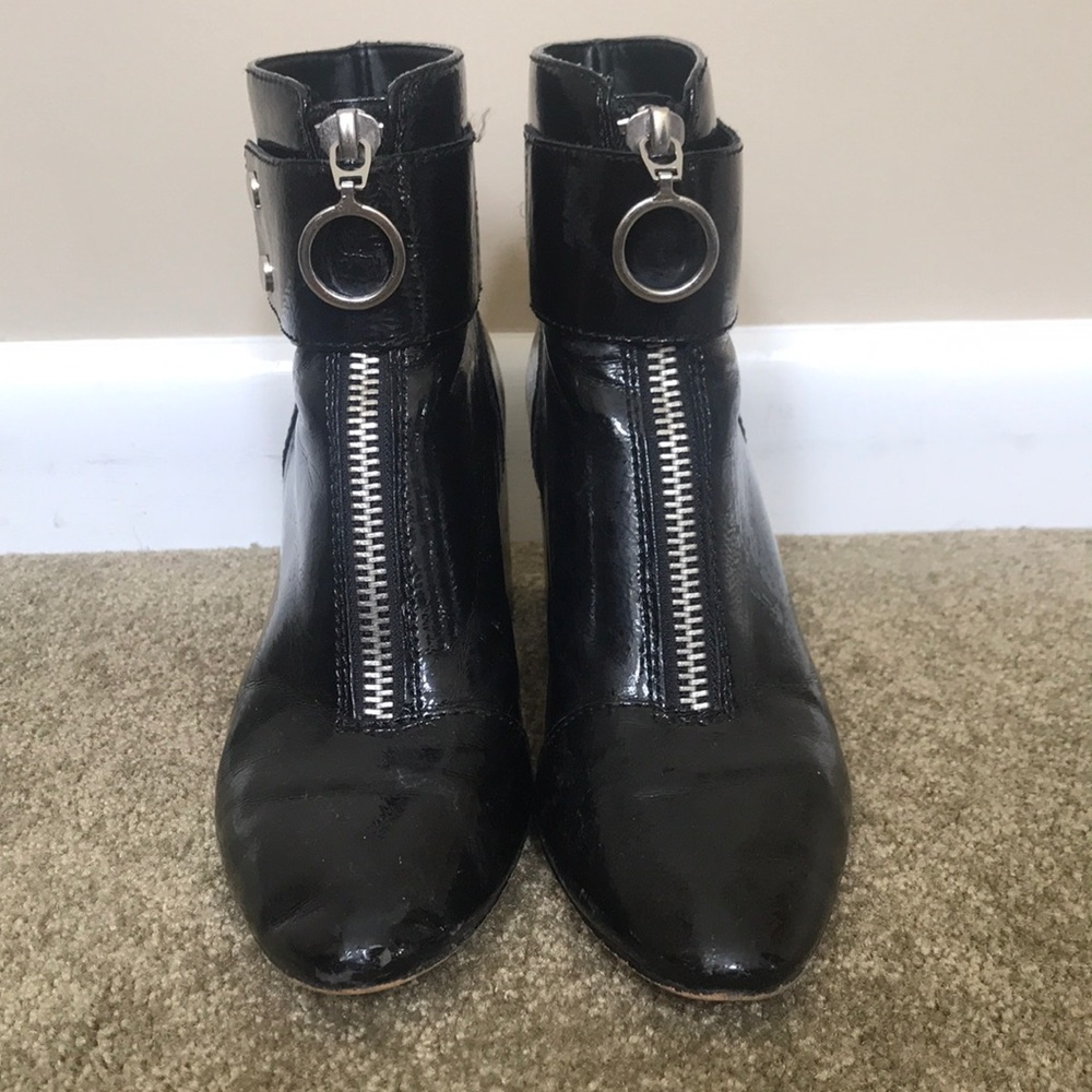 Dolce Vida black booties with silver accents